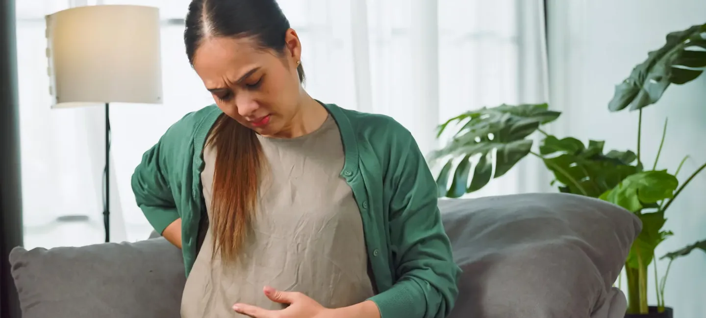 Coliques en début de grossesse : causes et solutions may app santé