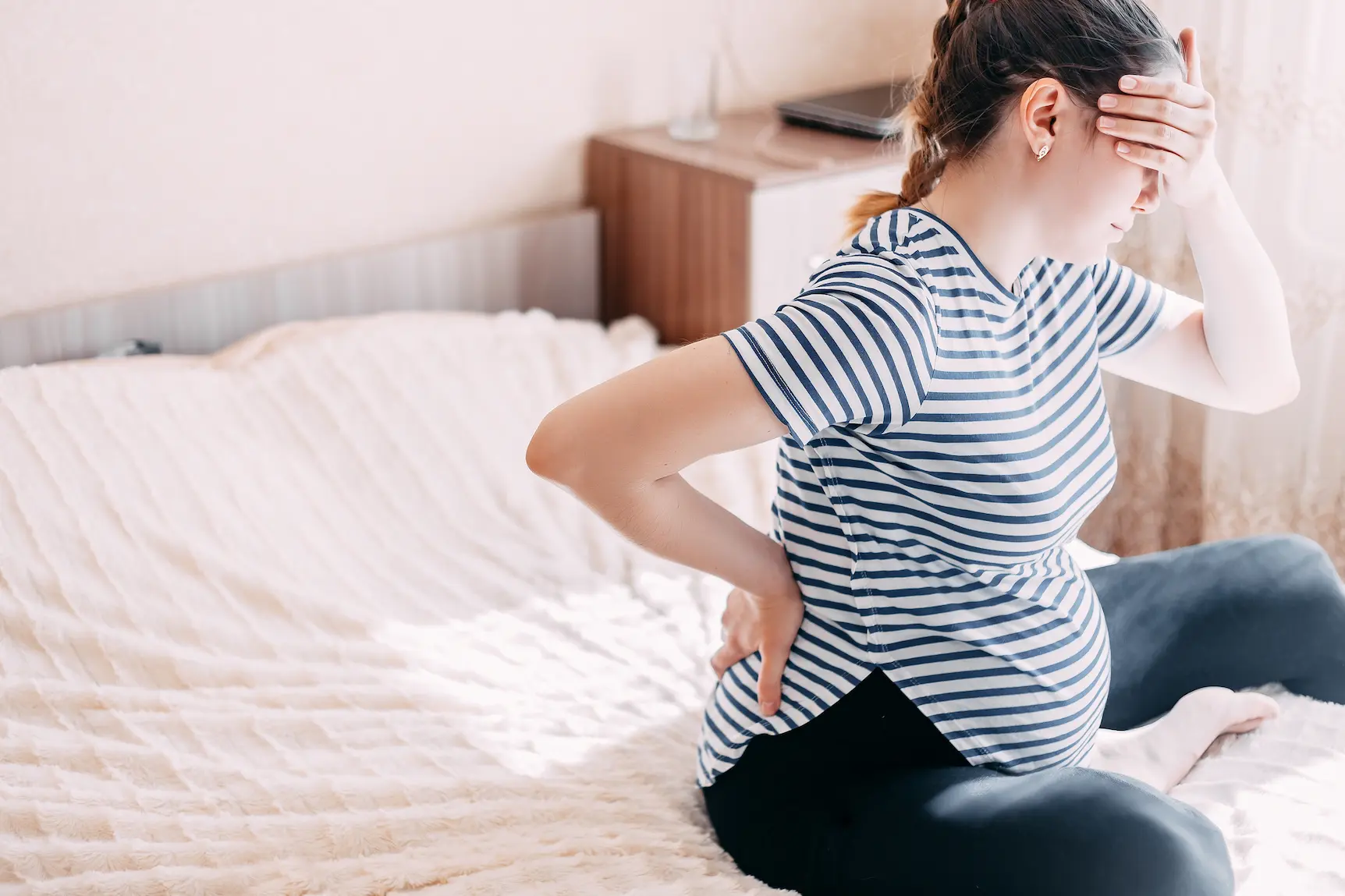 Mal de dos à 1 semaine de grossesse : causes et solutions 2 Mal de dos à 1 semaine de grossesse : causes et solutions may app santé
