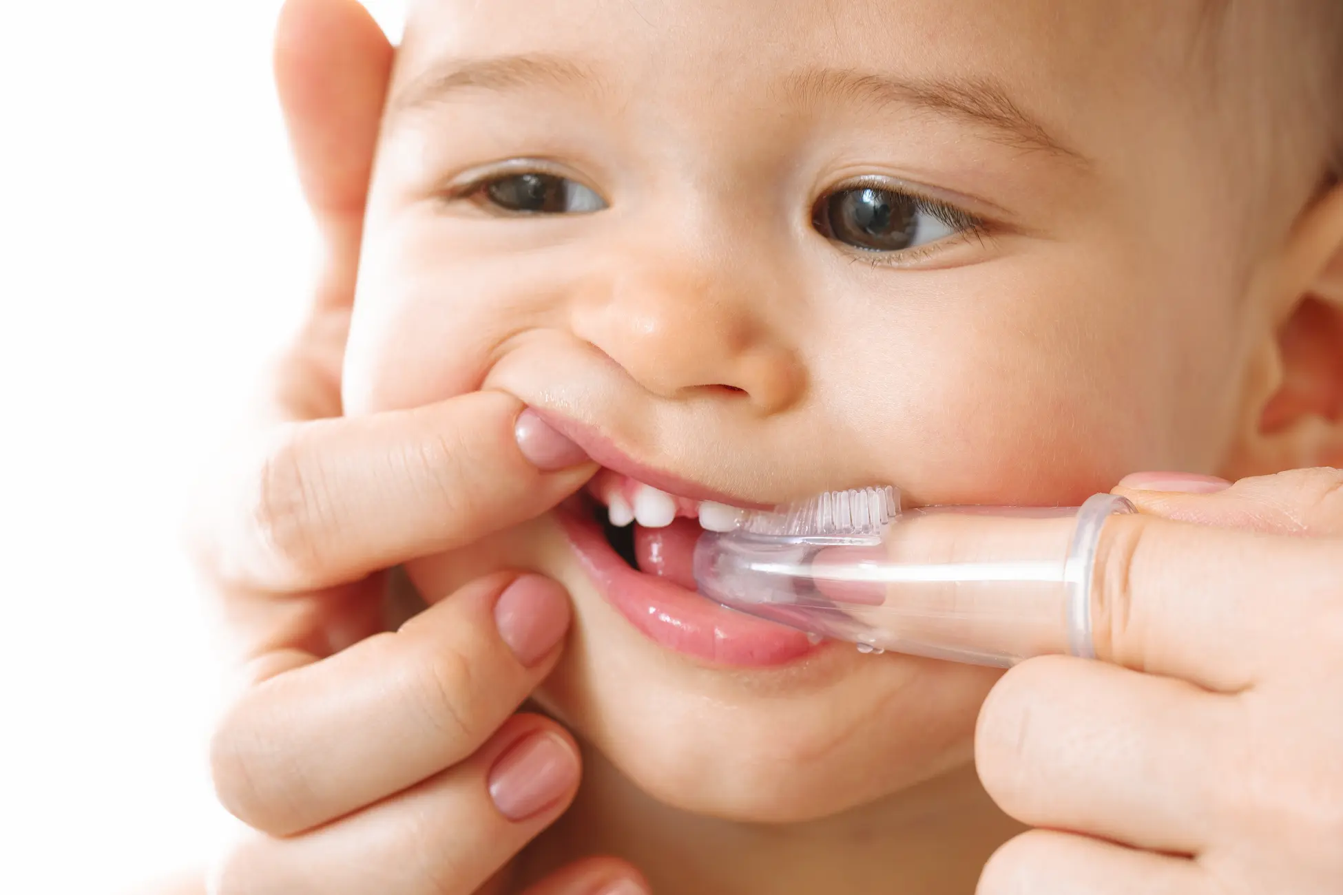 1ère dent de bébé : point blanc sur la gencive, que faire ? may app santé