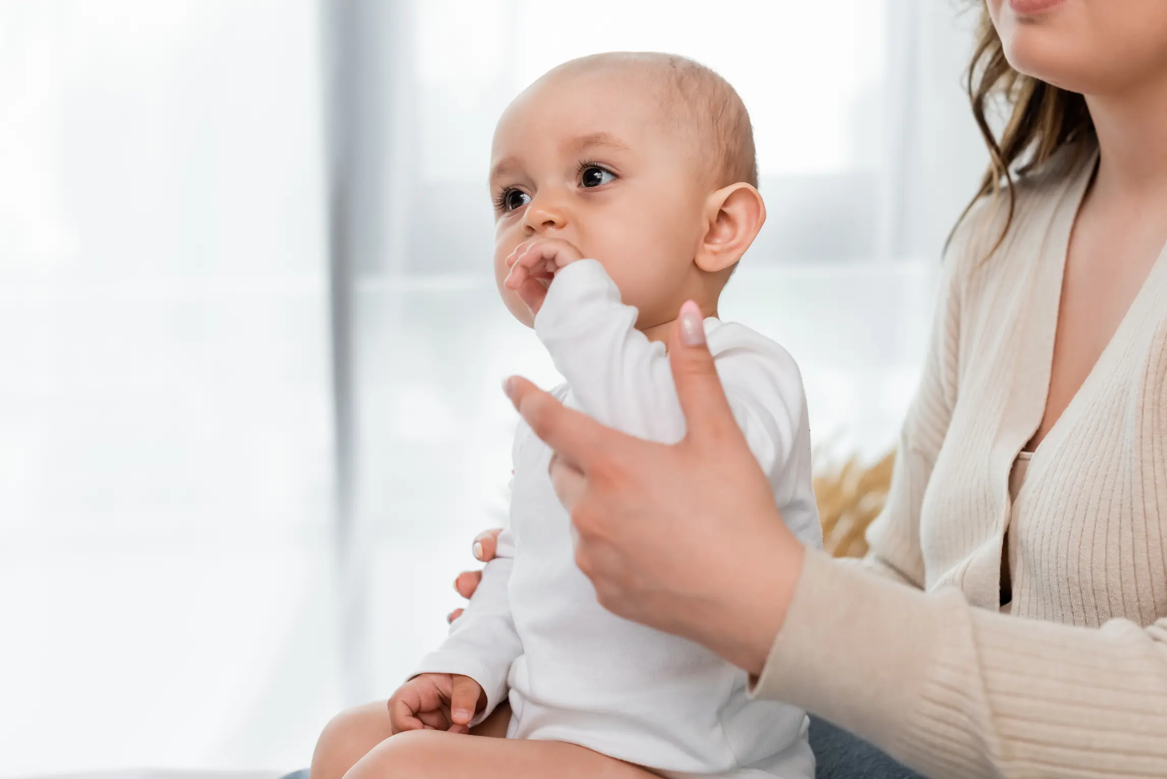 1ère dent de bébé : point blanc sur la gencive, que faire ? may app santé