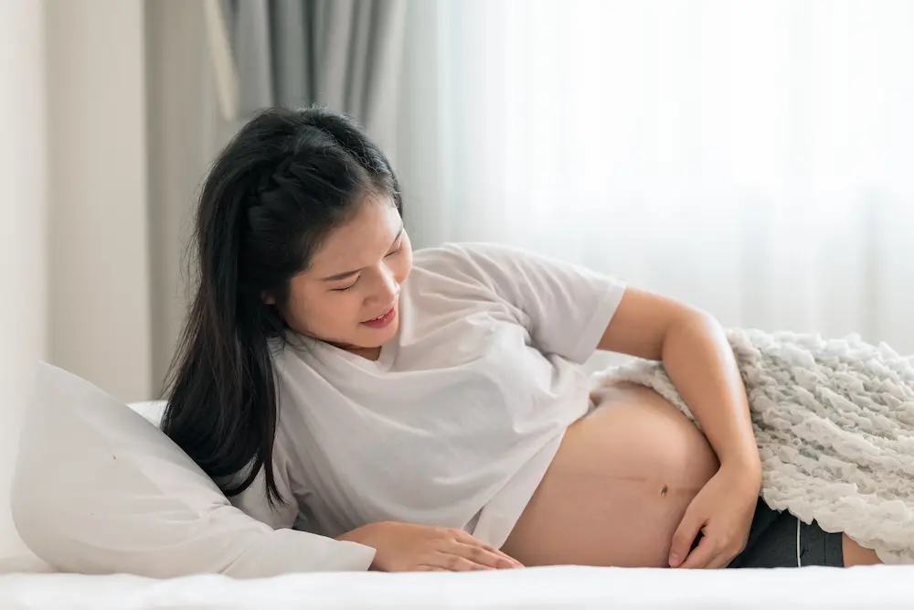 Coup dans le ventre enceinte : quand s’inquiéter ? - May App Santé