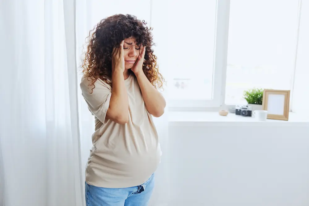 Mal de dent femme enceinte : que penser du clou de girofle ? - May App Santé